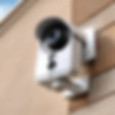 A sleek wireless outdoor security camera mounted on a wall.